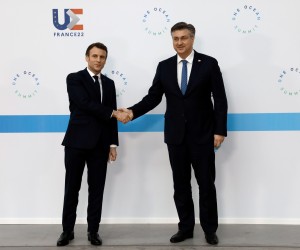 epa09746092 France's President Emmanuel Macron (L) welcomes Croatia's Prime Minister Andrej Plenkovic (R) before the High Level Segment session of the One Ocean Summit, in Brest, France, 11 February 2022. The session seeks to raise the international community's ambitions to protect sealife, cut plastic pollution and tackle the impact of climate change.  EPA/LUDOVIC MARIN / POOL  MAXPPP OUT
