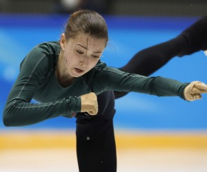 epa09748643 Figure skater Kamila Valieva of the Russian Olympic Committee in action during a practice session at the Beijing 2022 Olympic Games, Beijing, China, 12 February 2022.  EPA/HOW HWEE YOUNG