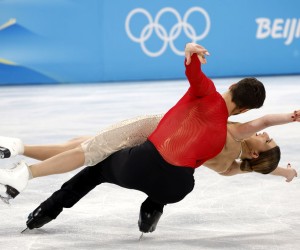 epa09754706 Gabriella Papadakis (back) and Guillaume Cizeron of France perform during the Ice Dance Free Dance of the Figure Skating events at the Beijing? 2022 Olympic Games, Beijing, China, 14 February 2022.  EPA/ROMAN PILIPEY