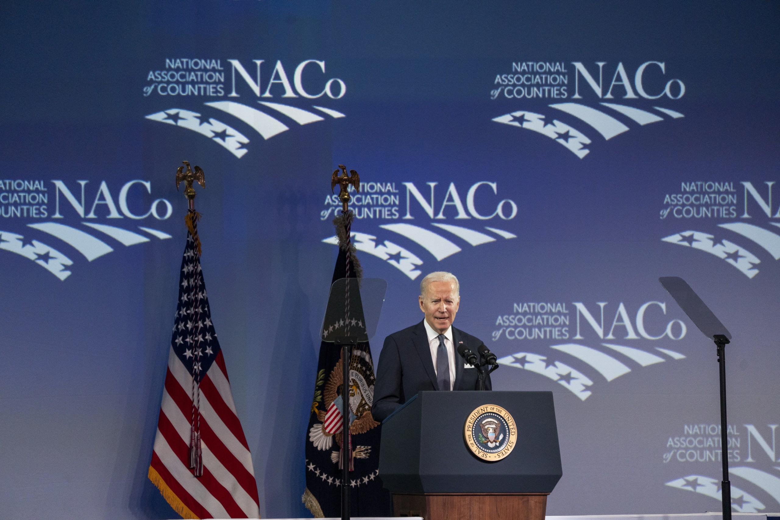 epa09760058 US President Joe Biden delivers remarks to bipartisan county officials from around the country at the National Association of Counties 2022 Legislative Conference in Washington, DC, USA, 15 February 2022.  EPA/SHAWN THEW