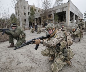 epa09772013 Reservists of the Ukrainian Territorial Defence attend a military exercise near Kiev, Ukraine, 19 February 2022, amid escalation on the Ukraine-Russian border. According to a survey conducted by the Kiev International Institute of Sociology (KIIS) from December 2021, 50.2 percent of Ukrainians said they would resist in case of a Russian military intervention into their city, town or village. Every third respondent to the poll said they were ready to engage in armed resistance, and 21.7 percent said they were ready to participate in civil resistance actions.  EPA/SERGEY DOLZHENKO