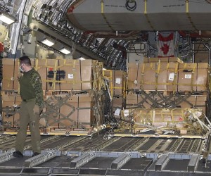 epa09773103 A handout picture made available by Defence Ministry press service shows crew members unload military aid delivered from the Canada to Ukraine from the C-17 cargo plane of the Royal Canadian Air Force , at the airport outside of Western-Ukrainian city of Lviv, Ukraine 19 February 2022. Canada has sent a second weapon shipment to Ukraine amid fears of a Russian invasion. The first plane landed in Ukraine on 04 February 2022.  EPA/Defence Ministry press service handout  HANDOUT EDITORIAL USE ONLY/NO SALES