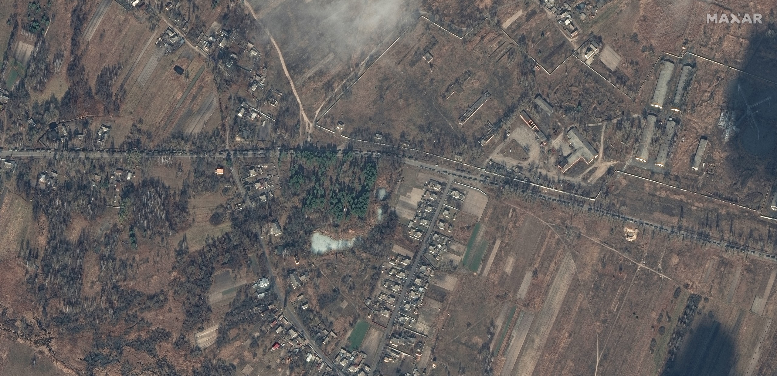 epa09789920 A handout satellite image made available by Maxar Technologies shows Russian ground forces in convoy near of Ivankiv, Ukraine, 27 February 2022. Russian troops entered Ukraine on 24 February prompting the country's president to declare martial law and triggering a series of announcements by Western countries to impose severe economic sanctions on Russia.  EPA/MAXAR TECHNOLOGIES HANDOUT -- MANDATORY CREDIT: SATELLITE IMAGE 2022 MAXAR TECHNOLOGIES -- THE WATERMARK MAY NOT BE REMOVED/CROPPED -- HANDOUT EDITORIAL USE ONLY/NO SALES