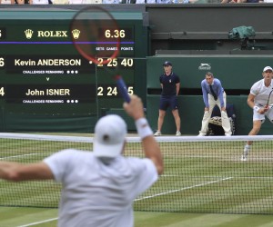 A scoreboard shows the time of the Gentlemen's Singles Semi-finals of the Wimbledon Championships between Kevin Anderson (R) of South Africa and John Isner of United States of America, 6hours and 36 minutes in London on July 13, 2018. Anderson won the event which was 6hours 36 minutes match that is the second longest in the Wimbledon Championships singles( The Yomiuri Shimbun via AP Images )