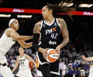 FILE - Phoenix Mercury center Brittney Griner (42) looks to pass as Chicago Sky center Candace Parker defends during the first half of game 1 of the WNBA basketball Finals , Sunday, Oct. 10, 2021, in Phoenix.   Griner was arrested in Russia last month at a Moscow airport after a search of her luggage revealed vape cartridges. The Russian Customs Service said Saturday, March 5, 2022,  that the cartridges were identified as containing oil derived from cannabis, which could carry a maximum penalty of 10 years in prison. The customs service identified the person arrested as a female player for the U.S. national team and did not specify the date of her arrest. (AP Photo/Ralph Freso, File)