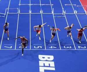 Grant Holloway, of the United States, 3rd left, wins a Men's 60 meters hurdles semifinal at the World Athletics Indoor Championships in Belgrade, Serbia, Sunday, March 20, 2022. (AP Photo/Petr David Josek)