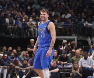 Dallas Mavericks guard Luka Doncic (77) smiles during the second half of an NBA basketball game against the Utah Jazz in Dallas, Sunday, March 27, 2022. (AP Photo/LM Otero)