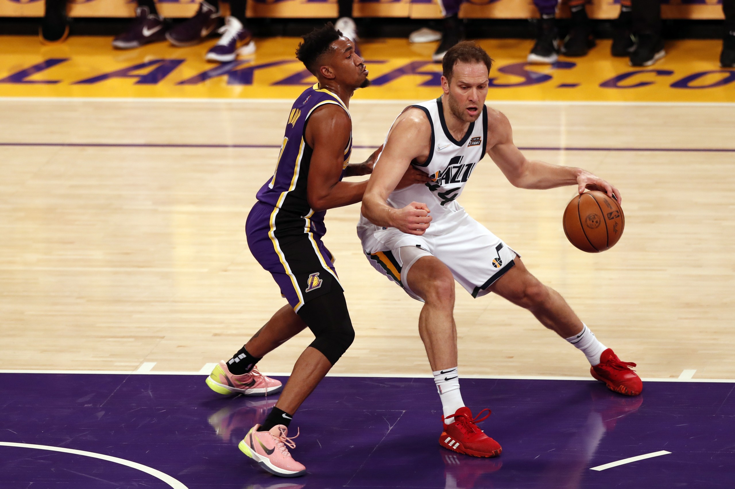 epa09764417 Utah Jazz forward Bojan Bogdanovic (R) in action against Los Angeles Lakers guard Malik Monk (L) during the first quarter of the NBA game between the Los Angeles Lakers and the Utah Jazz at the Crypto.com Arena in Los Angeles, California, USA, 16 February 2022.  EPA/ETIENNE LAURENT  SHUTTERSTOCK OUT