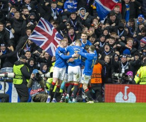 epa09782762 Rangers celebrate after scoring a penalty by James Tavernier during the UEFA Europa League playoff soccer match between Glasgow Rangers FC and Borussia Dortmund at Ibrox Stadium, in Glasgow, Scotland, 24 February 2022.  EPA/ROBERT PERRY