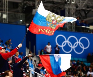 epa09792091 (FILE) - Russian fans wave flags during the men's preliminary round ice hockey match between Russia and the USA inside the Gangneung Hockey Centre at the PyeongChang Winter Olympic Games 2018 in Gangneung, South Korea, 17 February 2018 (re-issued on 28 February 2022). The International Olympic Committee (IOC) on 28 February 2022 recommended that athletes and officials from Russia and Belarus are banned from all international sports competitions.  EPA/LARRY W. SMITH