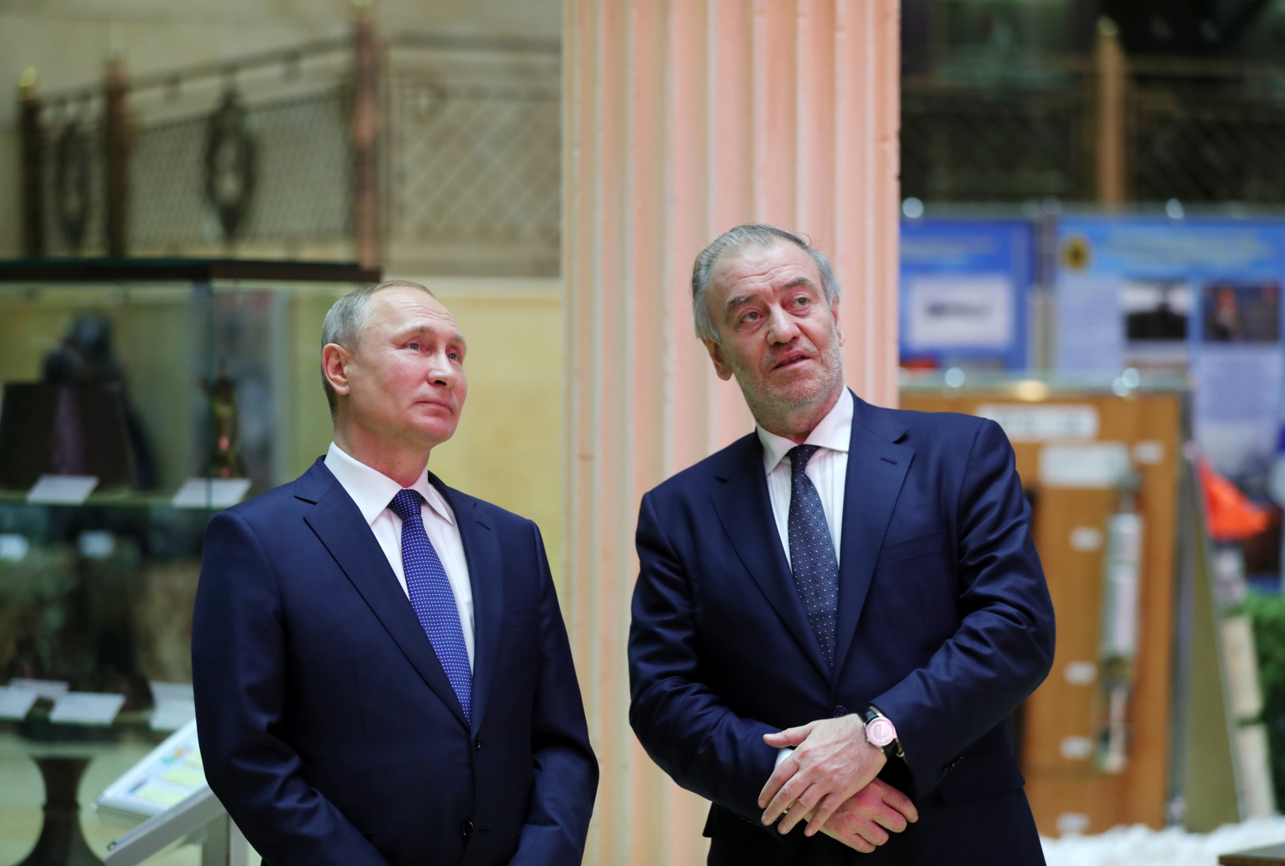 epa09793398 (FILE) - Russian President Vladimir Putin (L) and Mariinsky Theatre artistic director Valery Gergiev (R) attend an exhibition as part of a military-practical conference on the outcome of the special operation in Syria, at Russia's National Defense Control Center in Moscow, Russia, 30 January 2018 (reissued 01 March 2022). Munich Mayor Reiter has removed  Russian conductor Valery Gergiev from the role of Chief Conductor of the Munich Philharmonic, a statement by the mayor reads on 01 March 2022. "Valery Gergiev has not spoken out despite my call to 'clearly and unequivocally distance himself from the brutal war of aggression that Putin is waging against Ukraine and now in particular against our twin city of Kyiv," the mayor explains his decision. Russian troops entered Ukraine on 24 February prompting the country's president to declare martial law and triggering a series of severe economic sanctions imposed by Western countries on Russia.  EPA/MICHAEL KLIMENTYEV / SPUTNIK / K MANDATORY CREDIT *** Local Caption *** 54077450