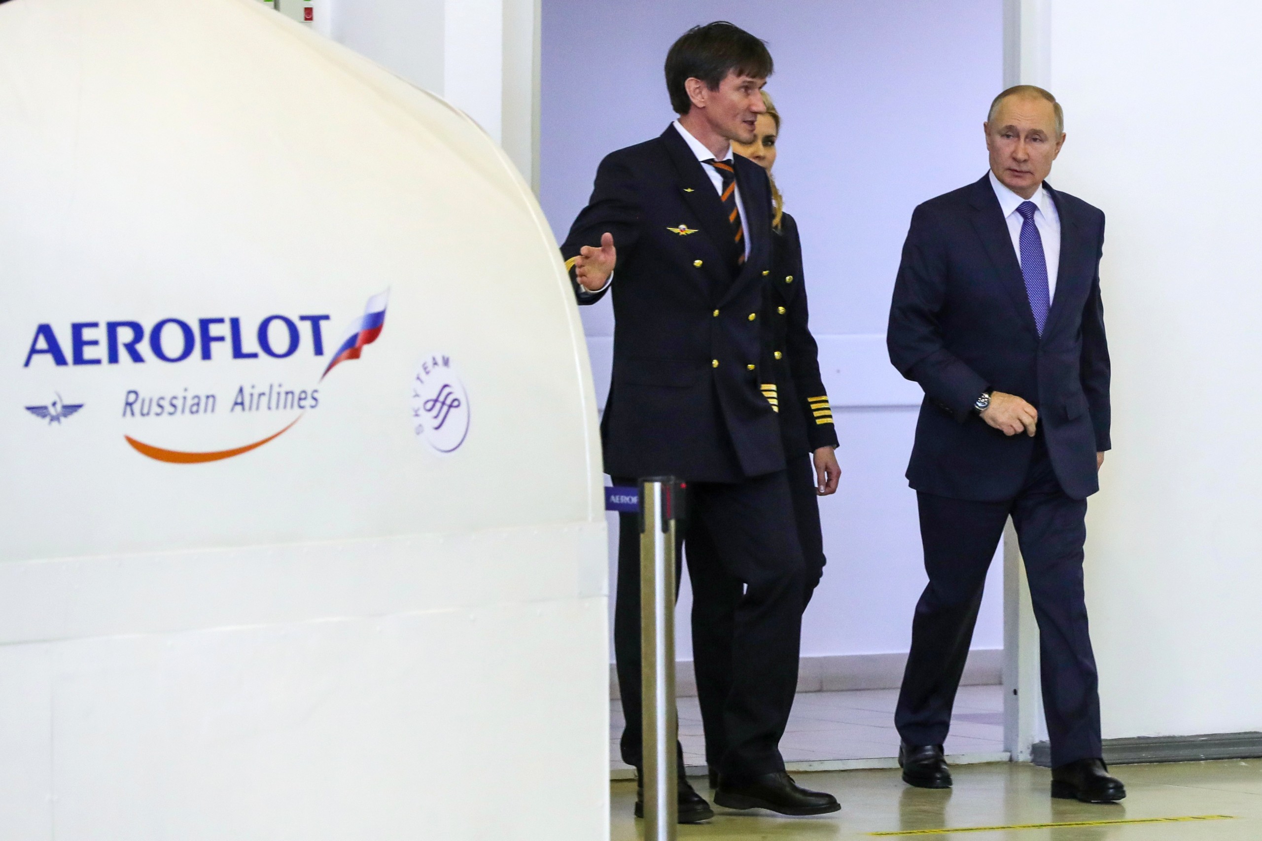 epa09803932 Russian President Vladimir Putin (R) examines simulators for the flight crew during his visit to the aviation training center of PJSC Aeroflot on the eve of International Women's Day in Moscow, Russia, 05 March 2022. The European Union imposed a ban on flights of Russian aircraft over its entire territory. As a mirror measure, Russia officially banned the use of its airspace by airlines from 36 countries. Russian troops entered Ukraine on 24 February prompting the country's president to declare martial law and triggering a series of severe economic sanctions imposed by Western countries on Russia.  EPA/MIKHAEL KLIMENTYEV/SPUTNIK/KREMLIN POOL / POOL