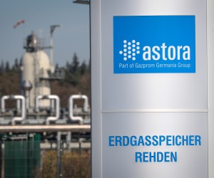epa09812306 A logo at the entrance of the Astora reservoir for natural gas in Rehden, northern Germany, 09 March 2022. With a storage capacity of 3.9 billion cubic meters, the Rehden storage facility is the largest natural gas storage facility in Western Europe. Astora belongs to Gazprom Germania.  EPA/FOCKE STRANGMANN