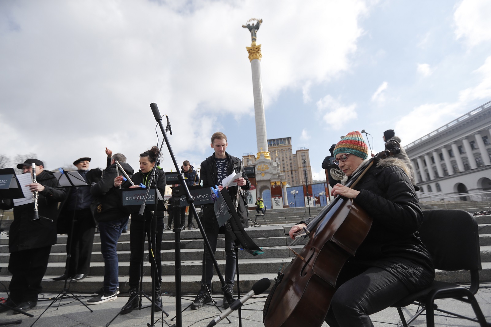 epa09812502 Members of the Kyiv-Classic symphonic orchestra perform demanding to close the sky over Ukraine at the Independence Square in Kyiv (Kiev), Ukraine, 09 March 2022. According to the United Nations High Commissioner for Refugees (UNHCR), Russia's military invasion of Ukraine, which started on 24 February, has caused destruction of civilian infrastructure as well as civilian casualties, with tens of thousands internally displaced and over two million refugees fleeing Ukraine.  EPA/ZURAB KURTSIKIDZE