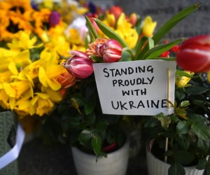 epa09814809 Tributes to Ukraine decorate a monument to St. Volodymyr the Great, near Ukraine's Embassy in London, Britain, 10 March 2022. According to United Nations High Commissioner for Refugees (UNHCR) figures, more than two million Ukrainians have fled their country since Russia began its military invasion of Ukraine on 24 February 2022.  EPA/NEIL HALL