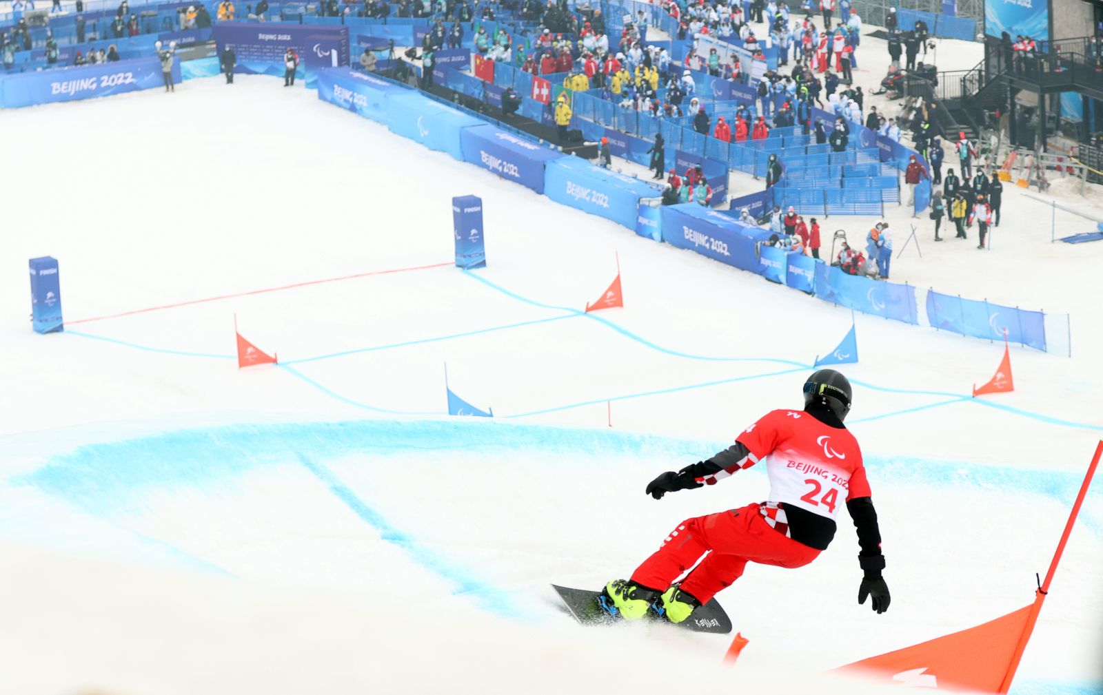 Peking, 11.03.2022 - Hrvatski paraolimpijac Bruno Bonjak tijekom utrke snowborda, banked slalom na Paraolimijskim igrma Peking 2022. Na slici Bruno Bonjak.
foto HINA/ Damir SENCAR/ ds