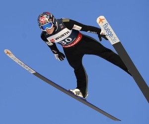 epa09819364 Marius Lindvik of Norway is airborne during the Men's HS240 competition at the FIS Ski Jumping World Cup in Vikersund, Norway, 12 March 2022.  EPA/Terje Bendiksby  NORWAY OUT