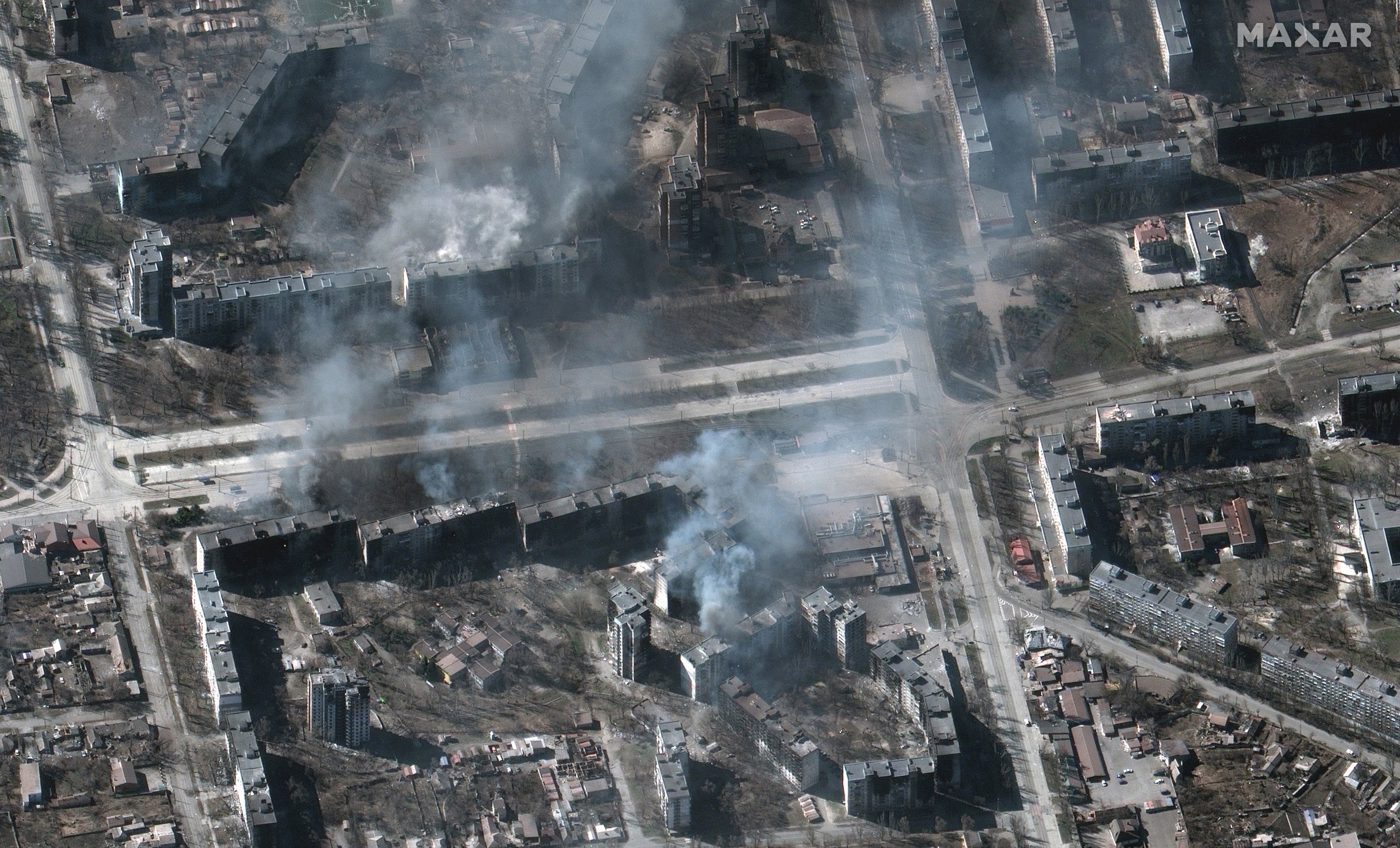epa09843367 A handout satellite image made available by Maxar Technologies shows buildings on fire, in Mariupol, Ukraine, 22 March 2022.  Russian troops entered Ukraine on 24 February prompting the country's president to declare martial law and triggering a series of announcements by Western countries to impose severe economic sanctions on Russia.  EPA/MAXAR TECHNOLOGIES HANDOUT -- MANDATORY CREDIT: SATELLITE IMAGE 2022 MAXAR TECHNOLOGIES -- THE WATERMARK MAY NOT BE REMOVED/CROPPED -- HANDOUT EDITORIAL USE ONLY/NO SALES