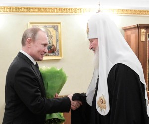 FILE PHOTO: Russian President Vladimir Putin congratulates Patriarch Kirill of Moscow and All Russia on the day of the 11th anniversary of his enthronement in Moscow, Russia February 1, 2020. Sputnik/Alexei Druzhinin/Kremlin via REUTERS ATTENTION EDITORS - THIS IMAGE WAS PROVIDED BY A THIRD PARTY./File Photo Photo: SPUTNIK/REUTERS
