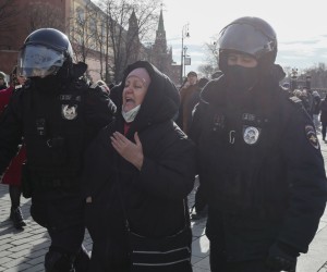 epa09805139 Russian policemen detain a participant in an unauthorized rally against the Russian invasion of Ukraine, in downtown Moscow, Russia, 06 March 2022. Kremlin critic Alexei Navalny on 04 March called on Russians worldwide to take to the streets on 06 March and protest against Putin's military operation in Ukraine. According to independent Russian human rights group OVD-Info, hundreds of people were arrested in protests throughout major Russian cities on 06 March.  EPA/YURI KOCHETKOV