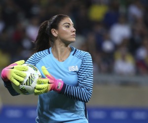 FILE - United States' goalkeeper Hope Solo takes the ball during a women's soccer game at the Rio Olympics against New Zealand in Belo Horizonte, Brazil, Aug. 3, 2016. Former U.S. women’s national team star goalkeeper Solo was arrested after police say she was found passed out behind the wheel of a vehicle in North Carolina with her two children inside. A police report said Solo was arrested on Thursday, March 31, 2022, in a shopping center parking lot in Winston-Salem and charged with driving while impaired, resisting a public officer and misdemeanor child abuse. (AP Photo/Eugenio Savio, File)