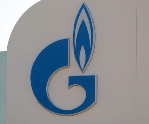 epa09846049 The Gazprom logo at a Gazprom Neft gas station in Moscow, Russia, 24 March 2022. Natural-gas and fuel prices shoot higher and the ruble strengthened after the Kremlin on 23 March called on non-friendly countries to pay for Russian gas in rubles.  EPA/MAXIM SHIPENKOV