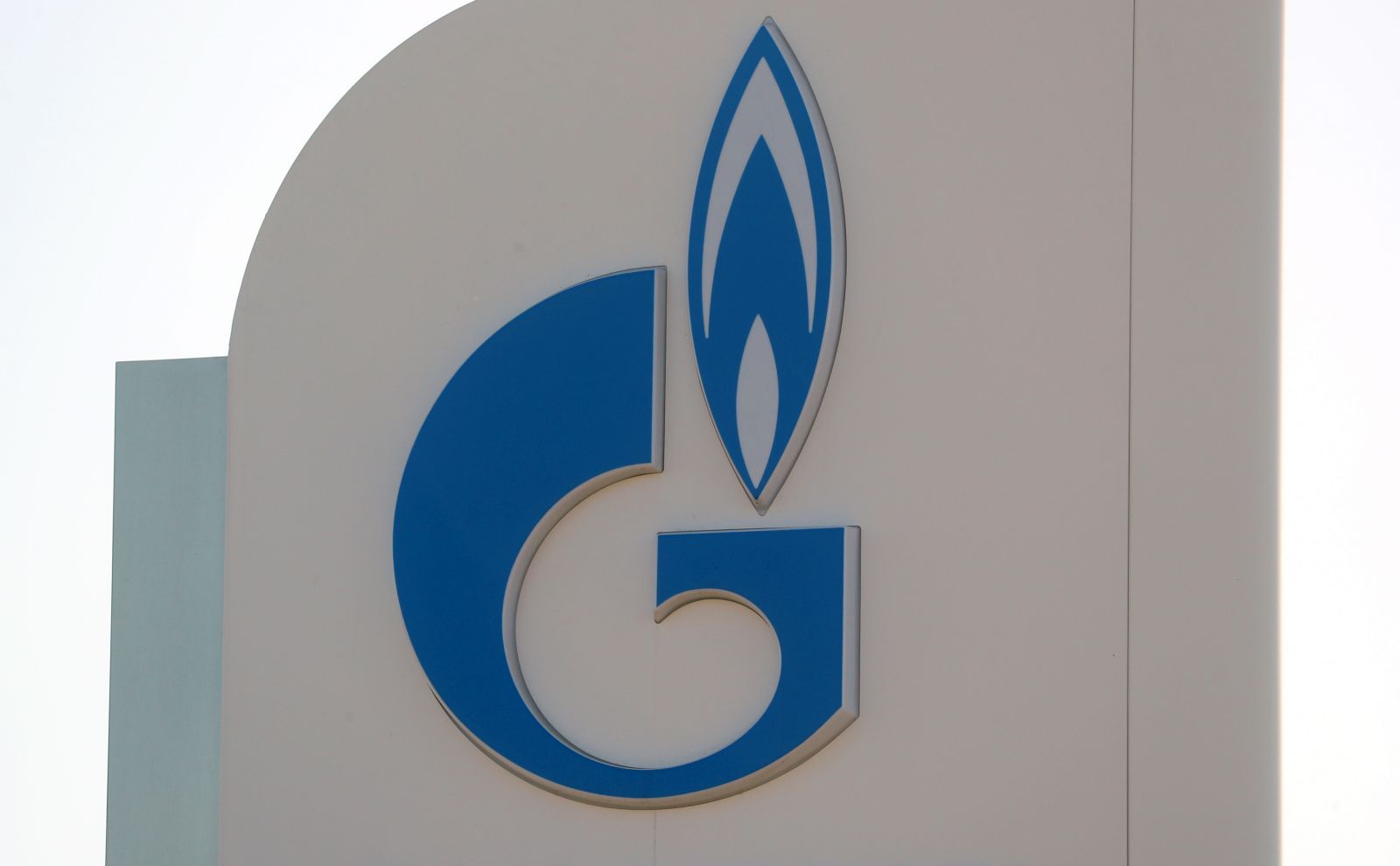 epa09846049 The Gazprom logo at a Gazprom Neft gas station in Moscow, Russia, 24 March 2022. Natural-gas and fuel prices shoot higher and the ruble strengthened after the Kremlin on 23 March called on non-friendly countries to pay for Russian gas in rubles.  EPA/MAXIM SHIPENKOV