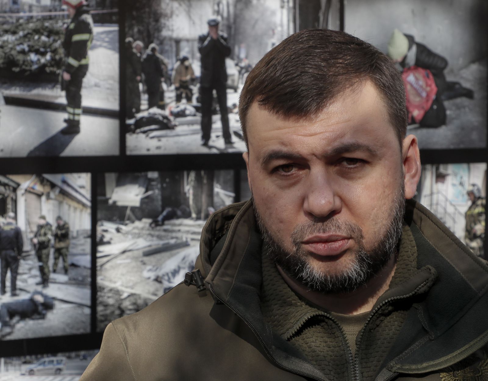 epa09852016 Head of the Donetsk People's Republic Denis Pushilin speaks with journalists at the place where people were killed in downtown of Donetsk, Ukraine, 26 March 2022. On 14 March over the building of the Government House in the center of Donetsk, air defense forces intercepted a missile of the tactical missile system 'Tochka-U' as a result of this, 21 people, including children, were killed and 36 were injured. On 24 February Russian troops had entered Ukrainian territory in what the Russian president declared a 'special military operation', resulting in fighting and destruction in the country, a huge flow of refugees, and multiple sanctions against Russia.  EPA/SERGEI ILNITSKY