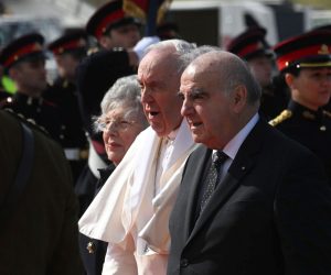 epa09865088 Malta's President George Vella (C-R) and his wife Miriam Vella (C-L) greet Pope Francis after he landed at Malta's international airport in Luqa, Malta, 02 April 2022. Pope Francis is in Malta for a two-day visit.  EPA/CIRO FUSCO