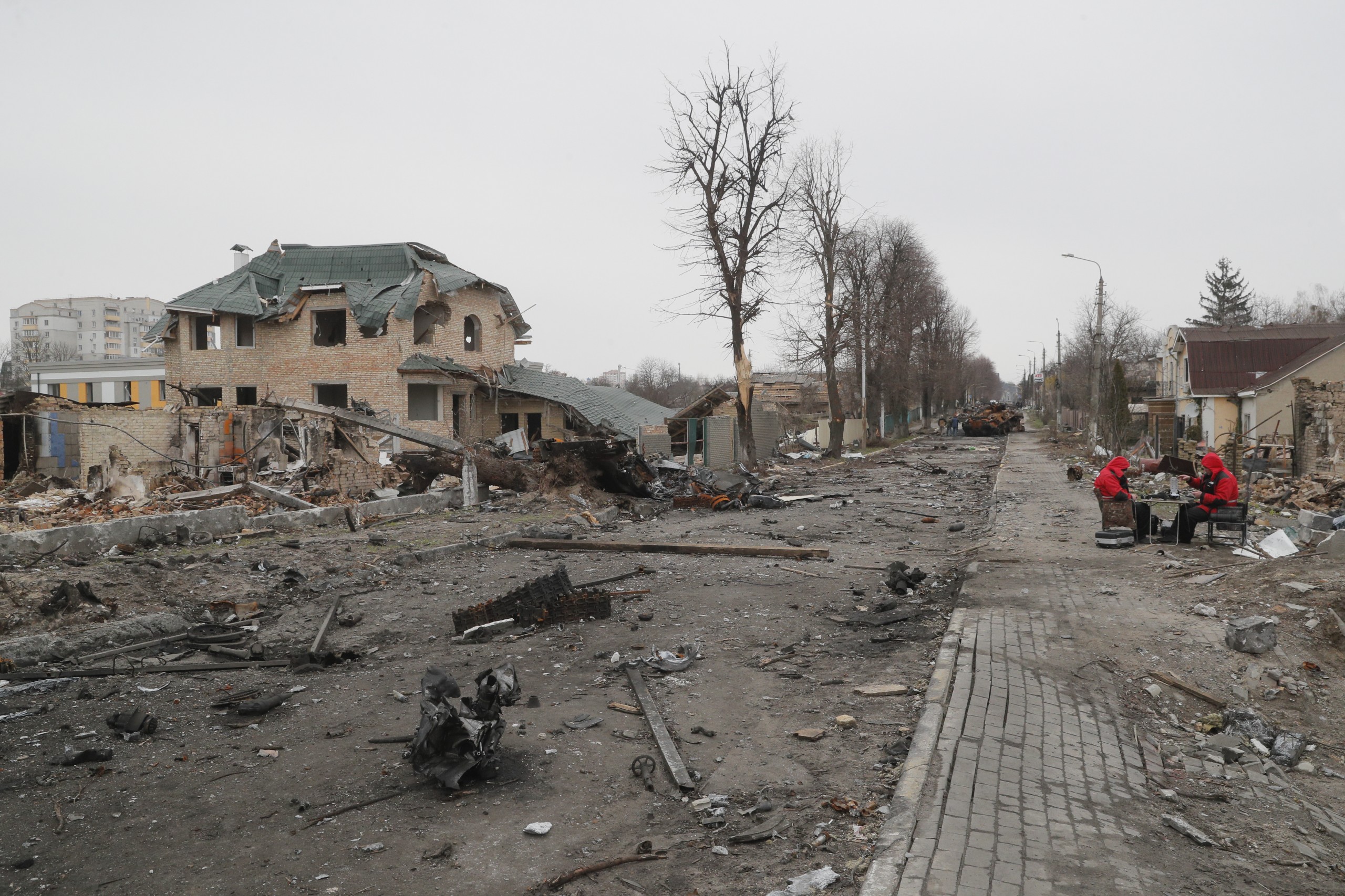 epa09872255 A picture taken during a visit to Bucha organized by Kyiv authorities shows a general view of a street with destroyed Russian military machinery in the recaptured by the Ukrainian army Bucha city near Kyiv, Ukraine, 05 April 2022. Russian troops entered Ukraine on 24 February resulting in fighting and destruction in the country, and triggering a series of severe economic sanctions on Russia by Western countries.  EPA/SERGEY DOLZHENKO