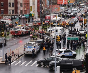 epa09886096 New York City Police, New York City Fire Department, and Federal officials on the scene of a reported multiple shooting at a New York City Subway station in the Brooklyn borough of New York, New York, USA, 12 April 2022.  EPA/JUSTIN LANE