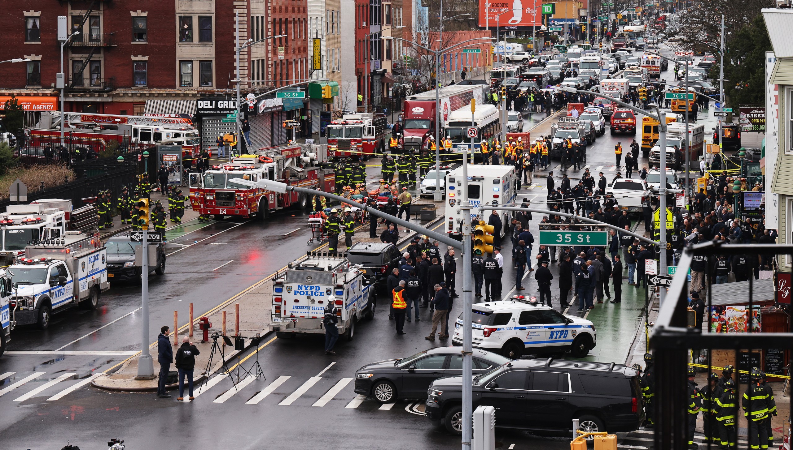 epa09886096 New York City Police, New York City Fire Department, and Federal officials on the scene of a reported multiple shooting at a New York City Subway station in the Brooklyn borough of New York, New York, USA, 12 April 2022.  EPA/JUSTIN LANE