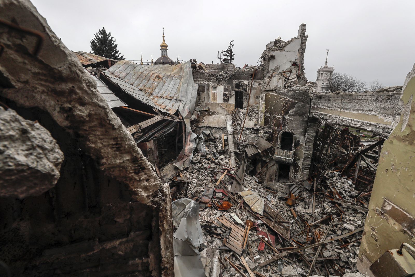 epa09886355 A picture taken during a visit to Mariupol organized by the Russian military shows destruction inside the destroyed Drama Theatre in Mariupol, Ukraine, 12 April 2022. At least 300 people died after a Russian airstrike on the Drama Theatre of Mariupol on 16 March, the Donetsk Regional State Administration sai whereas the Russian Defence Ministry denies the airstike and claims the theatre was blown up by the Azov battalion. Some 133,214 people, including two thousand people over the past day, left Mariupol through the gum corridor in the eastern direction, according to the head of the Russian National Defense Control Center.  EPA/SERGEI ILNITSKY