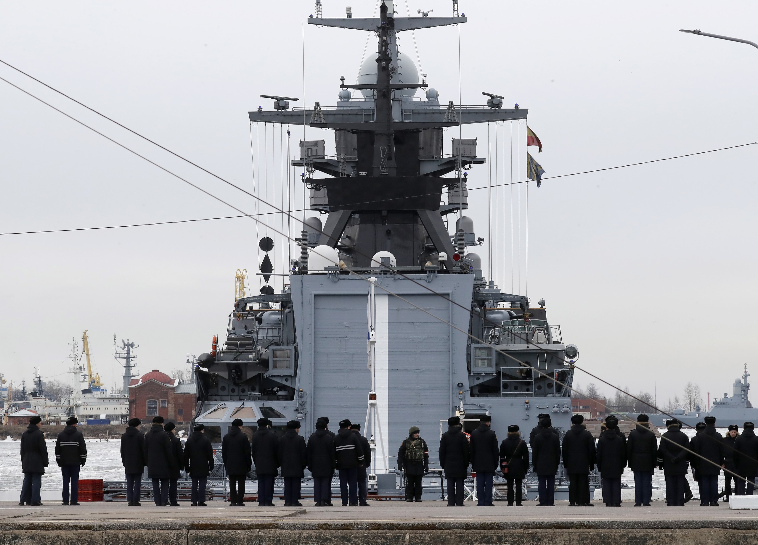 epa09889854 Russian Navy sailors stand in front of a naval ship in Kronstadt, near St. Petersburg, Russia, 14 April  2022.  EPA/ANATOLY MALTSEV