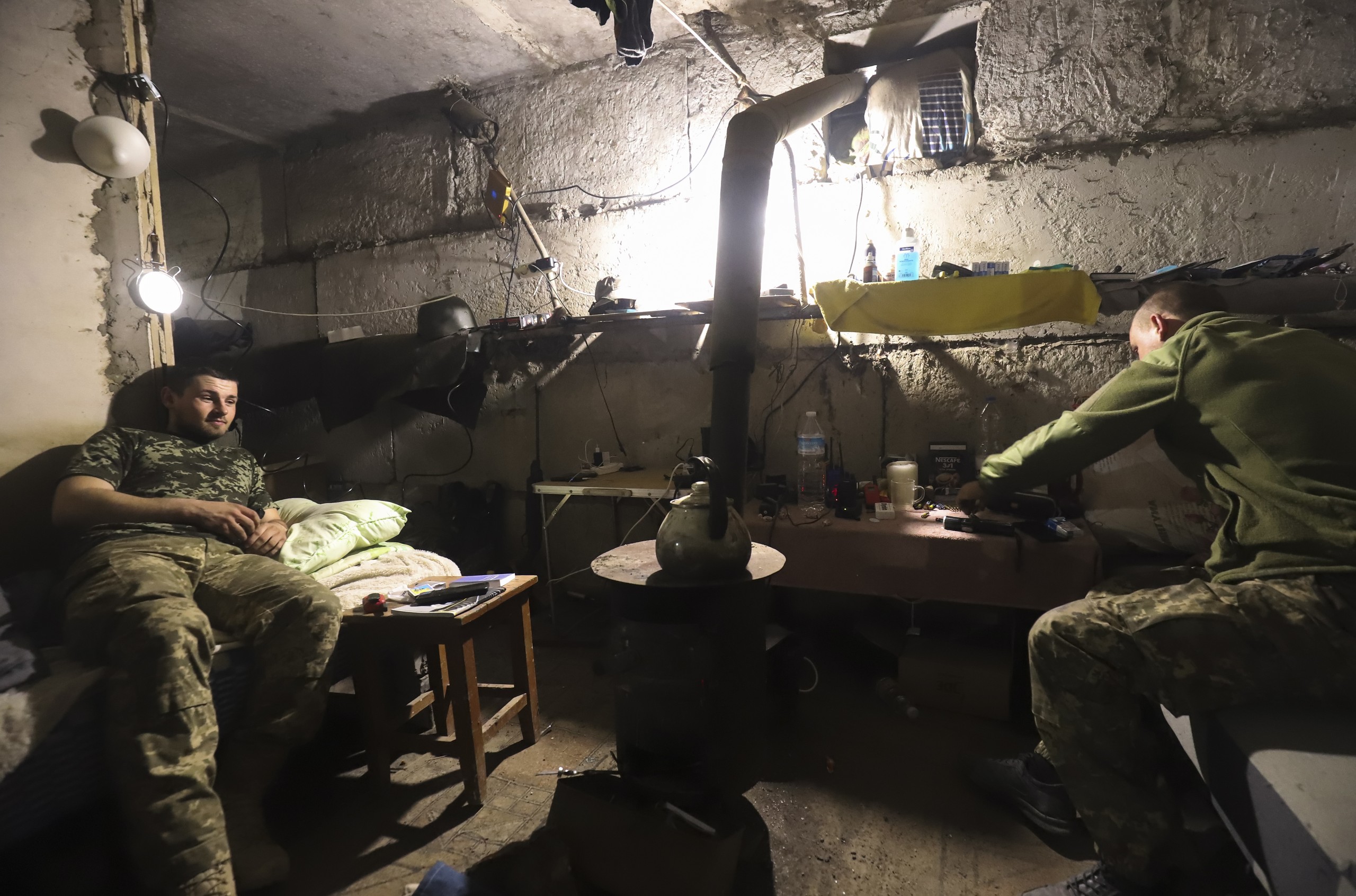 epa09893607 Ukrainian servicemen rest in Severodonetsk, North-West of Luhansk, Ukraine, 16 April 2022. Russian troops entered Ukraine on 24 February resulting in fighting and destruction in the country and triggering a series of severe international economic sanctions on Russia.  EPA/STR