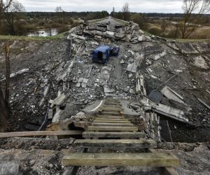 epa09893781 A destroyed bridge in Kukhari, Kyiv Oblast, Ukraine, 16 April 2022. On 24 February Russian troops entered Ukrainian territory resulting in fighting and destruction in the country, a huge flow of refugees, and multiple sanctions against Russia.  EPA/OLEG PETRASYUK