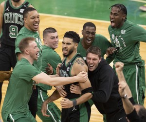 epa09895322 Boston Celtics forward Jayson Tatum (C) is mobbed as he celebrates makinig the winning basket in the final moments of the Eastern Conference First Round playoff game one between the Boston Celtics and the Brooklyn Nets at the TD Garden in Boston, Massachusetts, USA, 17 April 2022. The Boston Celtics lead the best of seven series 1-0.  EPA/CJ GUNTHER  SHUTTERSTOCK OUT