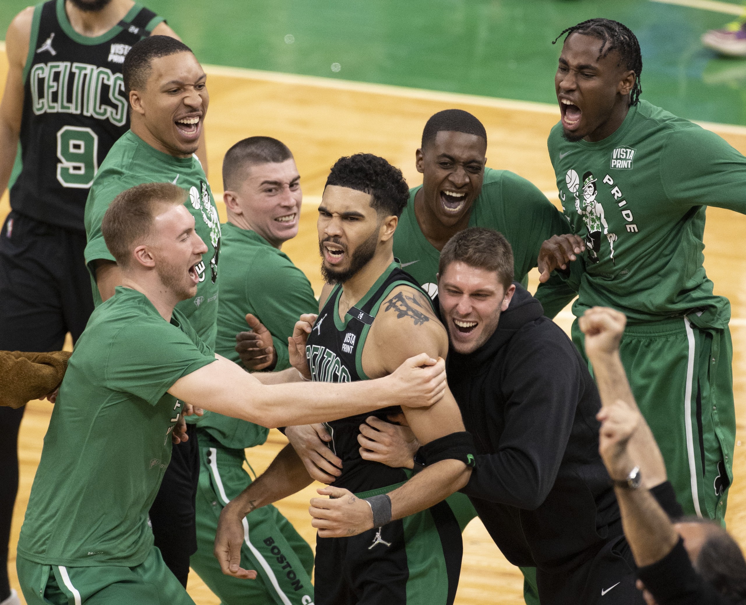epa09895322 Boston Celtics forward Jayson Tatum (C) is mobbed as he celebrates makinig the winning basket in the final moments of the Eastern Conference First Round playoff game one between the Boston Celtics and the Brooklyn Nets at the TD Garden in Boston, Massachusetts, USA, 17 April 2022. The Boston Celtics lead the best of seven series 1-0.  EPA/CJ GUNTHER  SHUTTERSTOCK OUT