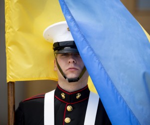 epa09901178 A member of a United States military color guard holds the national flag of Ukraine for an honor cordon ceremony welcoming Prime Minister of Ukraine Denys Shmyhal (not pictured) at the Pentagon in Arlington, Virginia, USA, 21 April 2022. Shmyhal is in Washington for a series of high-level meetings seeking continued US military and financial commitments to Ukraine as the Russian invasion continues in the eastern European country.  EPA/MICHAEL REYNOLDS