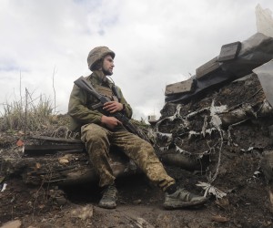 epa09902664 Ukrainian servicemen stand in their positions to wait for the attack of Russian troops near the small city of Horlivka of the Donetsk area, Ukraine, 22 April 2022 amid the Russian invasion. Russian troops entered Ukraine on 24 February resulting in fighting and destruction in the country and triggering a series of severe economic sanctions on Russia by Western countries.  EPA/STR