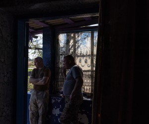 epa09913318 Members of the Ukrainian army stand inside a house in a frontline village at Huliaipole district, in the  Zaporizhzhia region, Ukraine, 27 April 2022. Russian troops entered Ukraine on 24 February resulting in fighting and destruction in the country and triggering a series of severe economic sanctions on Russia by Western countries.  EPA/ROMAN PILIPEY