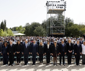 epa09913814 Israeli Prime Minister Naftali Bennett (5-L) and President Isaac Herzog (6-L) stand  together with other officials during the ceremony marking Holocaust Remembrance Day at Warsaw Ghetto Square at the Yad Vashem Holocaust Memorial in Jerusalem, Israel, 28 April 2022.  EPA/AMIR COHEN / POOL