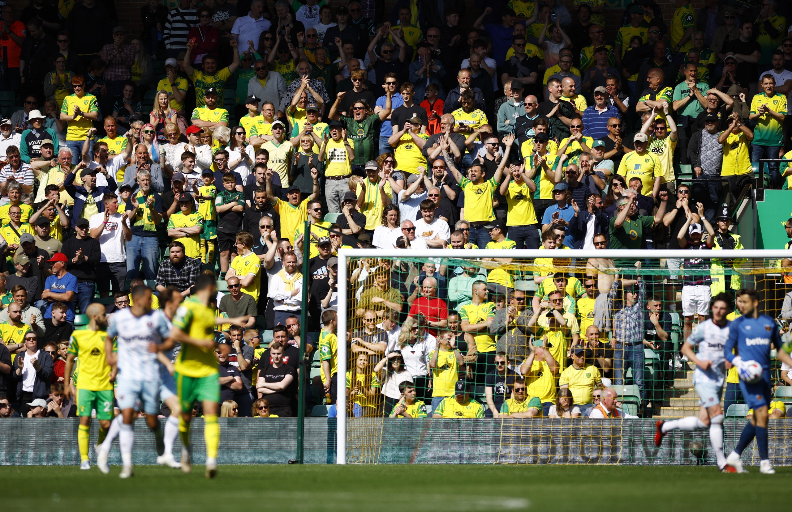 Soccer Football - Premier League - Norwich City v West Ham United - Carrow Road, Norwich, Britain - May 8, 2022 Norwich City fans in the stands Action Images via Reuters/Andrew Boyers EDITORIAL USE ONLY. No use with unauthorized audio, video, data, fixture lists, club/league logos or 'live' services. Online in-match use limited to 75 images, no video emulation. No use in betting, games or single club /league/player publications.  Please contact your account representative for further details.