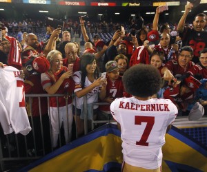 September 1, 2016 - San Diego, CA, USA - SAN DIEGO, CA - SEPTEMBER 1, 2016 - San Francisco 49ers quarterback Colin Kaepernick signs autographs for fans after a preseason game against the San Diego Chargers. Kaepernick kneeled during the national anthem before the game. San Francisco 49ers quarterback Colin Kaepernick takes photos with fans after a preseason game against the San Diego Chargers. Kaepernick kneeled during the national anthem before the game.  - ZUMAs44_