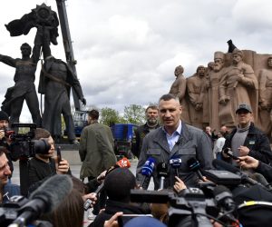 epa09910474 Kyiv's mayor Vitali Klitschko speaks with the press near the Monument of Friendship in Kyiv (Kiev) Ukraine, 26 April 2022. The Monument of Friendship between the Russian and Ukrainian nations was opened in 1982, on the 60th anniversary of founding of USSR. On April 25, Kyiv's mayor Vitali Klitschko announced the dismantling of the monument. On 24 February Russian troops had entered Ukrainian territory resulting in fighting and destruction in the country, a huge flow of refugees, and multiple sanctions against Russia.  EPA/OLEG PETRASYUK