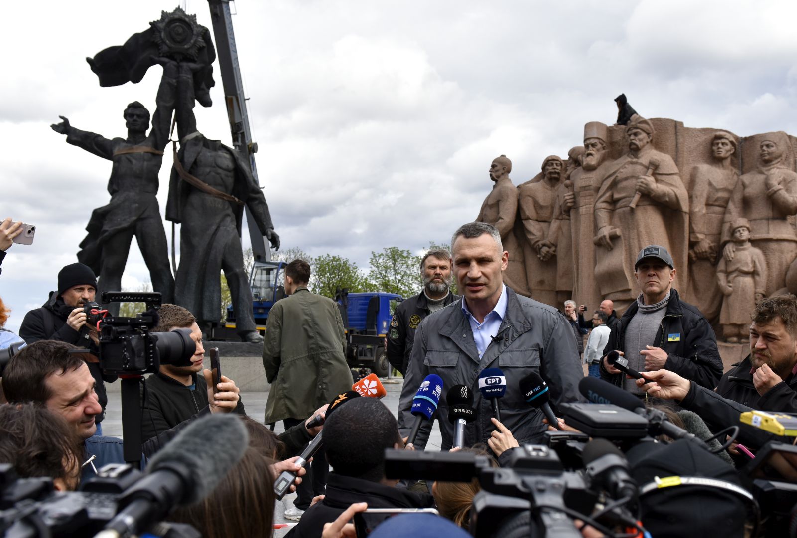 epa09910474 Kyiv's mayor Vitali Klitschko speaks with the press near the Monument of Friendship in Kyiv (Kiev) Ukraine, 26 April 2022. The Monument of Friendship between the Russian and Ukrainian nations was opened in 1982, on the 60th anniversary of founding of USSR. On April 25, Kyiv's mayor Vitali Klitschko announced the dismantling of the monument. On 24 February Russian troops had entered Ukrainian territory resulting in fighting and destruction in the country, a huge flow of refugees, and multiple sanctions against Russia.  EPA/OLEG PETRASYUK