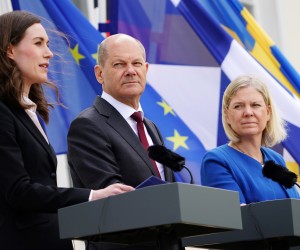epaselect epa09924339 (L-R) Finnish Prime Minister Sanna Marin, German Chancellor Olaf Scholz, and Swedish Prime Minister Magdalena Andersson during a joint press statement on the occasion of a closed meeting of the federal cabinet in Meseberg, Germany, 03 May 2022. Marin and Andersson are invited as guests to the meeting whose agenda will feature the impact of the war in Ukraine on European security policy, the federal government said. The German government meets for a two day retreat at the guest house of the German government in Meseberg near Berlin.  EPA/CLEMENS BILAN