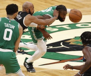 epa09925449 Boston Celtics guard Jaylen Brown (C) in action against Milwaukee Bucks center Bobby Portis (2-L) during the first half of the NBA Eastern Conference semifinal playoff game two between the Boston Celtics and the Milwaukee Bucs at TD Garden in Boston, Massachusetts, USA, 03 May 2022.  EPA/CJ GUNTHER  SHUTTERSTOCK OUT