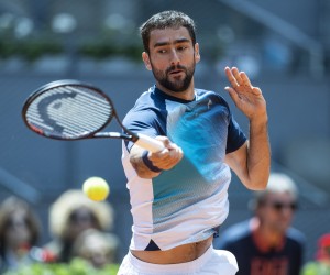 epaselect epa09926257 Marin Cilic of Croatia in action during his men's singles round of 32 match against Alexander Zverev of Germany at the Mutua Madrid Open tennis tournament at the Caja Magica in Madrid, Spain, 04 May 2022.  EPA/Rodrigo Jimenez
