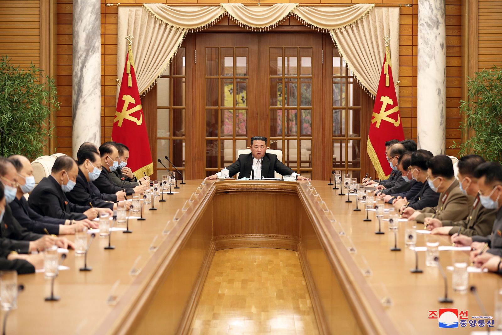 epa09941460 A photo released by the official North Korean Central News Agency (KCNA) shows the meeting of the 8th Political Bureau of 8th Central Committee of the WPK, convened at the office building of the Party Central Committee in Pyongyang, North Korea, 12 May 2022. Kim Jong-un (C), general secretary of the Workers' Party of Korea (WPK), presented at the meeting, held to organize the government's response to an outbreak of COVID-19 in Pyongyang.  EPA/KCNA   EDITORIAL USE ONLY